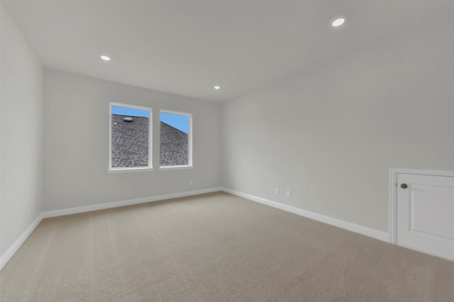 16163 Sheridan River Trl, Conroe, TX 77302 - carpeted spare room featuring baseboards and recessed lighting