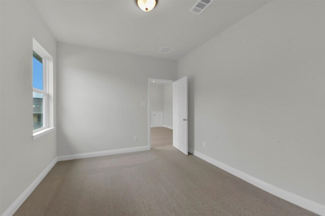 16163 Sheridan River Trl, Conroe, TX 77302 - empty room featuring carpet floors and baseboards