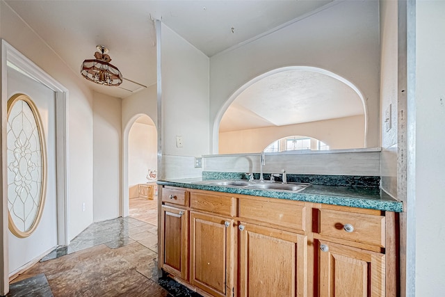 kitchen with sink and tasteful backsplash