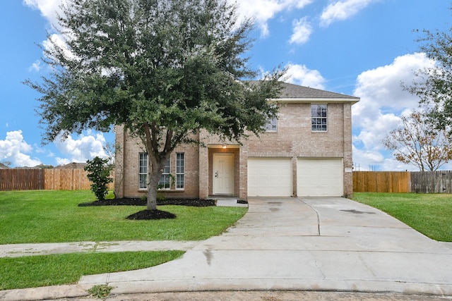 view of front facade featuring a garage and a front lawn