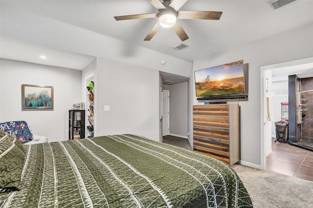 bedroom featuring ceiling fan and carpet