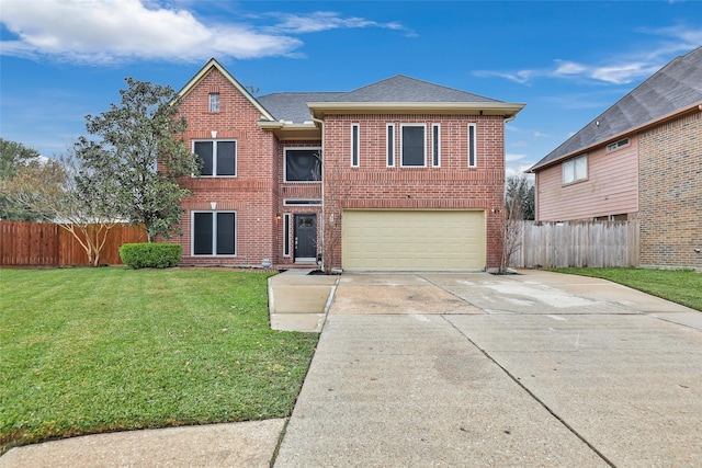 view of property with a front yard and a garage