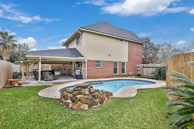 view of swimming pool with a lawn, a jacuzzi, grilling area, and a patio