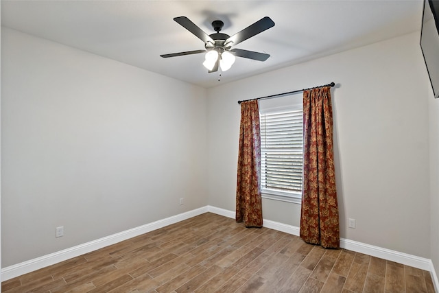 unfurnished room with ceiling fan and light hardwood / wood-style flooring