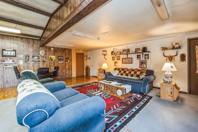 living room featuring parquet flooring and wooden walls