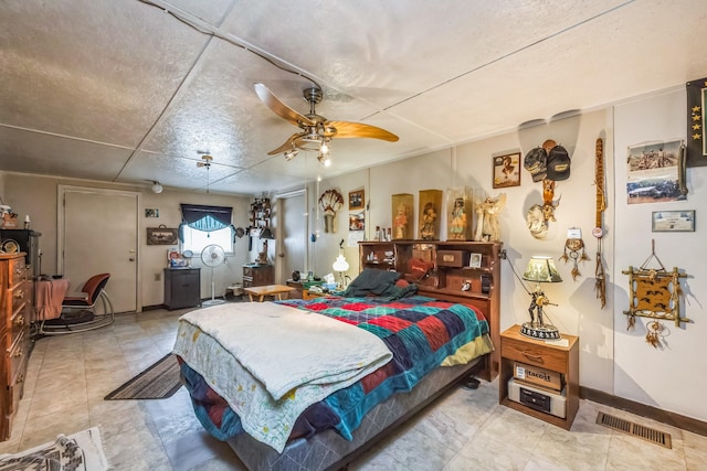 bedroom featuring ceiling fan