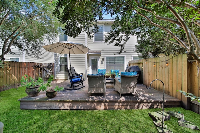 exterior space featuring an outdoor living space and a yard