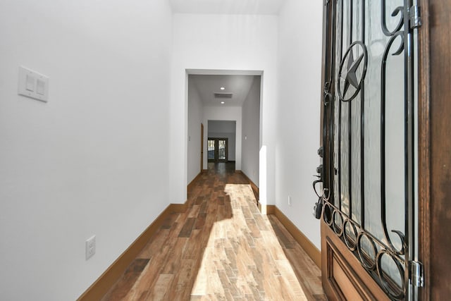 foyer with hardwood / wood-style floors