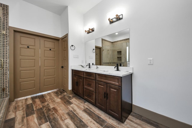 bathroom with vanity and an enclosed shower