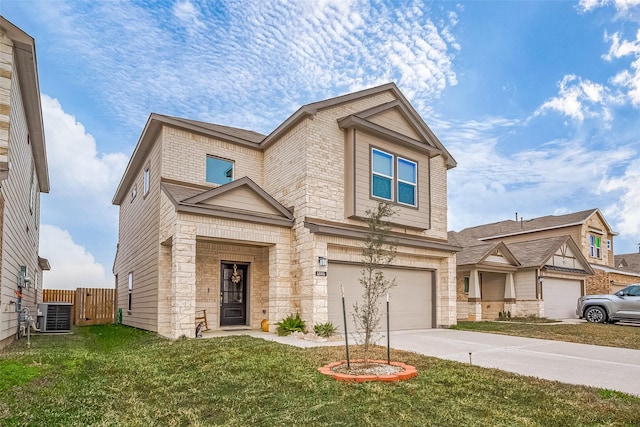 view of front of property with a front lawn, a garage, and central AC