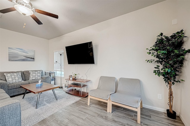 living room with ceiling fan