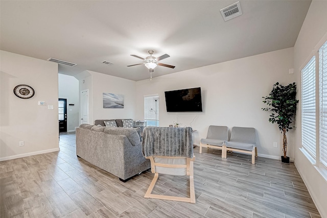 living room with ceiling fan