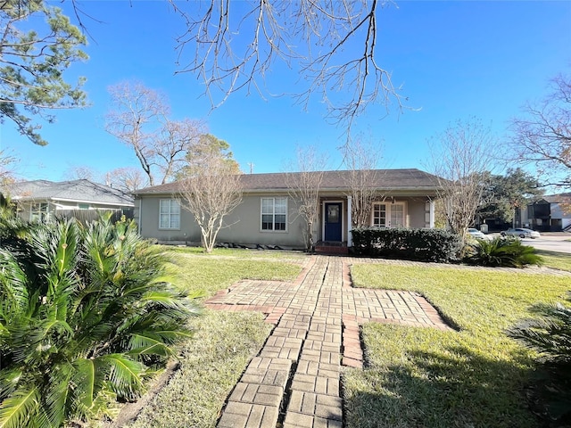 ranch-style house with a front yard