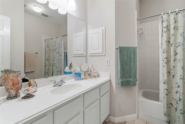 bathroom featuring shower / bath combination with curtain, vanity, and tile patterned flooring