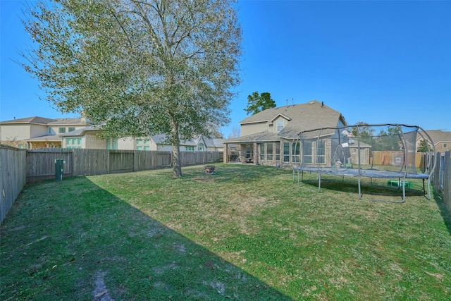 view of yard featuring a trampoline