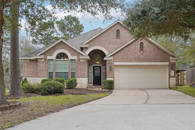 view of front of property with a garage