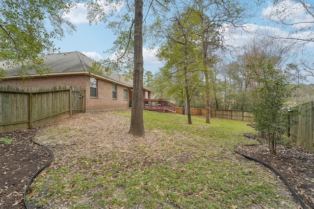 view of yard with a deck