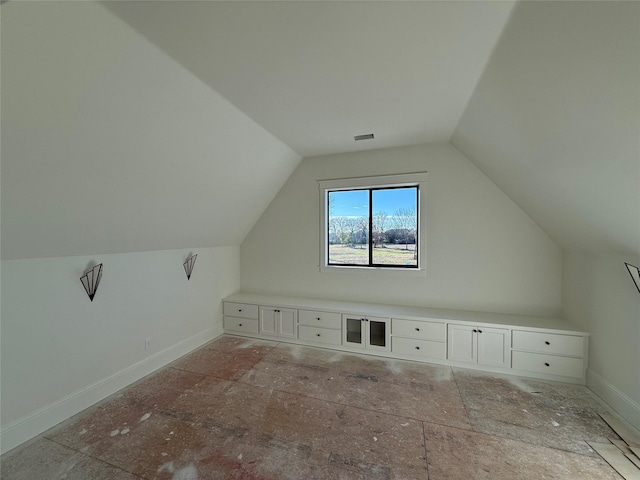 bonus room featuring lofted ceiling