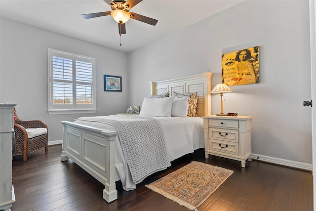 bedroom with dark wood-type flooring and ceiling fan