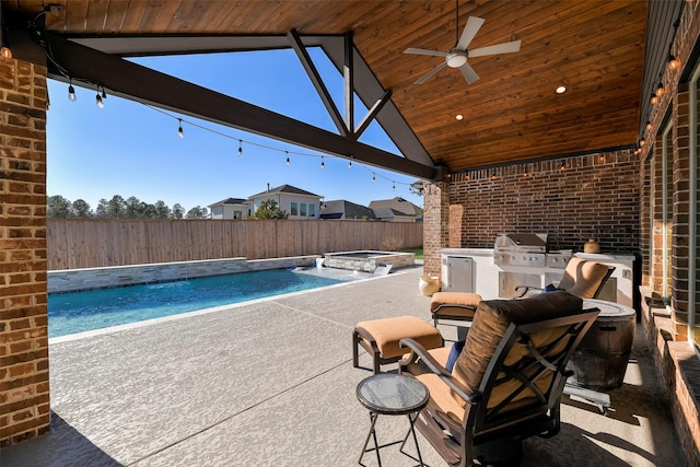 view of pool featuring area for grilling, an in ground hot tub, ceiling fan, grilling area, and a patio area