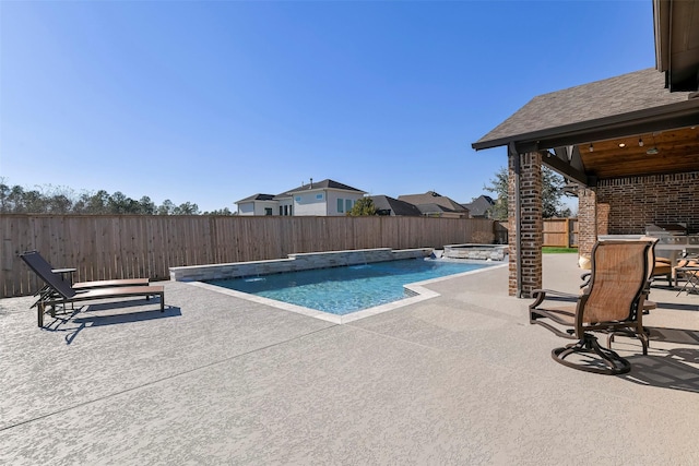 view of pool featuring a patio and pool water feature