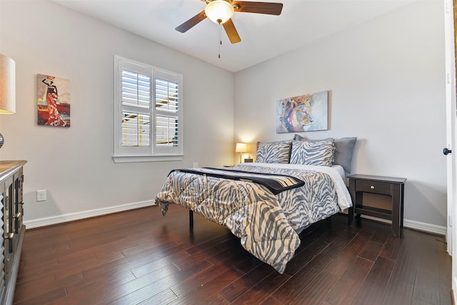 bedroom with dark wood-type flooring and ceiling fan