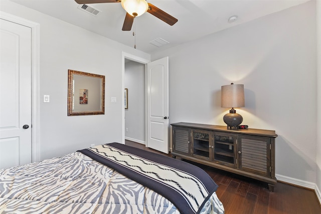 bedroom featuring dark wood-type flooring and ceiling fan