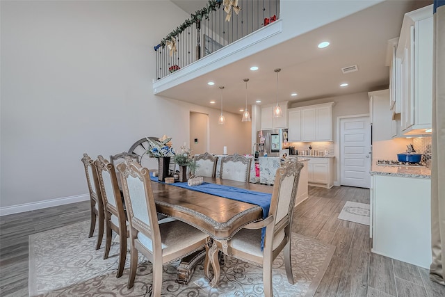 dining area featuring light hardwood / wood-style floors