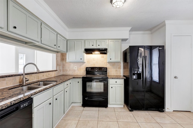 kitchen with backsplash, black appliances, sink, a textured ceiling, and dark stone counters