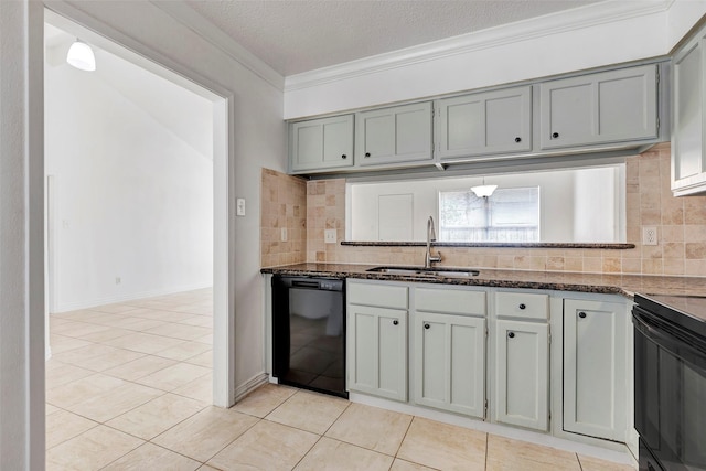 kitchen featuring black appliances, sink, light tile patterned flooring, and decorative backsplash