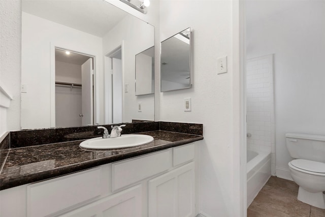 full bathroom featuring shower / bathtub combination, toilet, and vanity