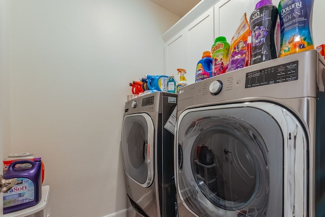 laundry room with independent washer and dryer