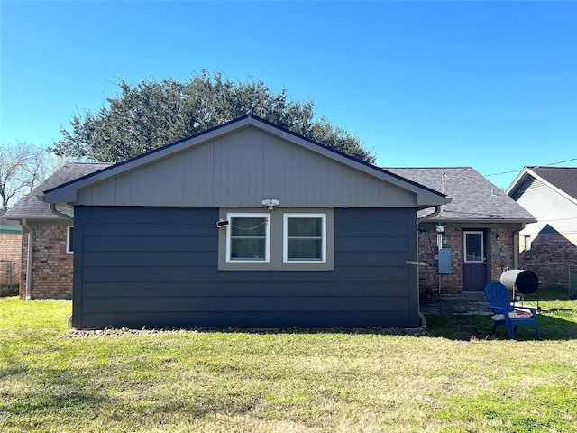 exterior space with a front lawn