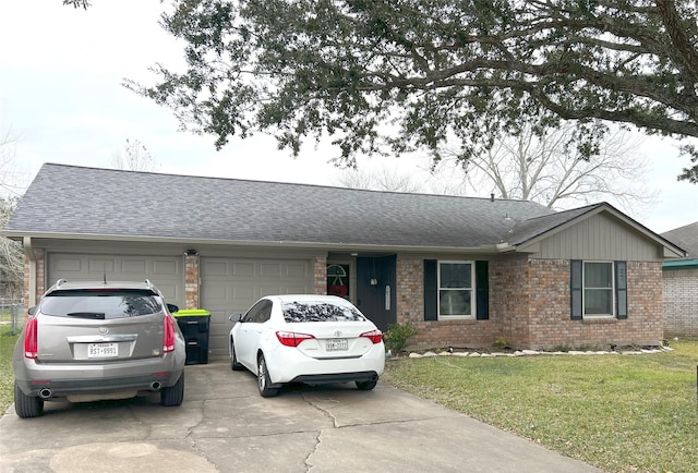 single story home with a front yard and a garage