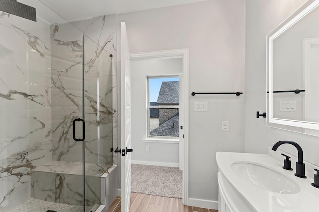 bathroom featuring vanity and walk in shower