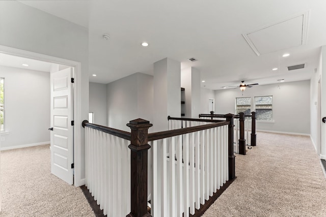 hallway featuring carpet floors