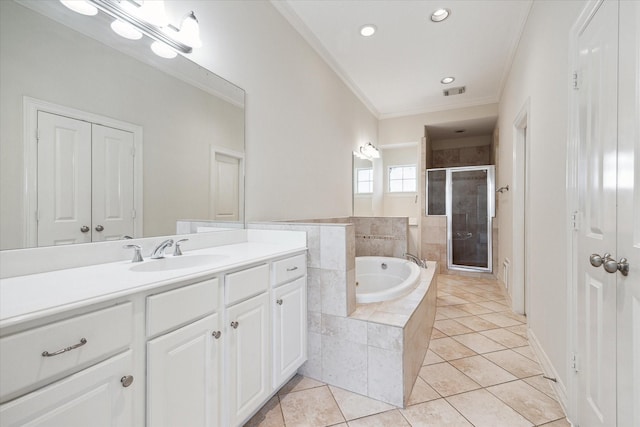 bathroom featuring crown molding, tile patterned floors, separate shower and tub, and vanity