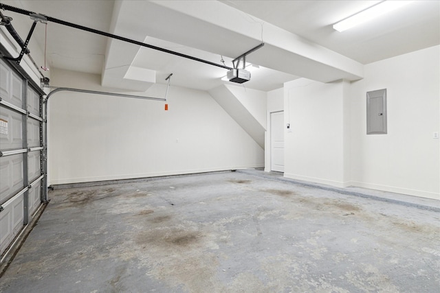 garage featuring a garage door opener and electric panel