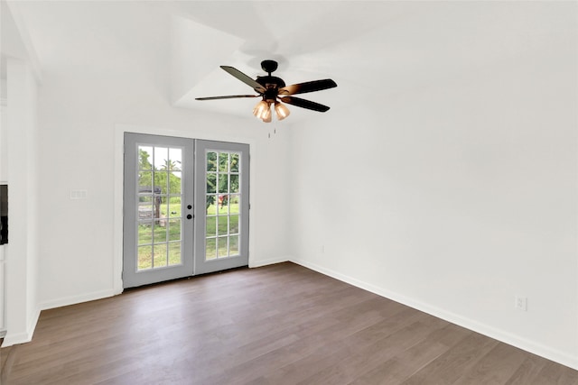 unfurnished room featuring ceiling fan, hardwood / wood-style flooring, and french doors