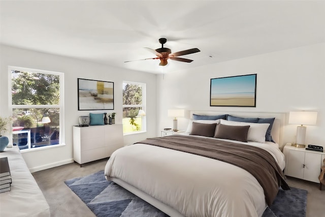 bedroom featuring ceiling fan and carpet floors