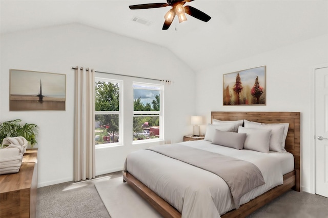 bedroom featuring ceiling fan, carpet, and lofted ceiling