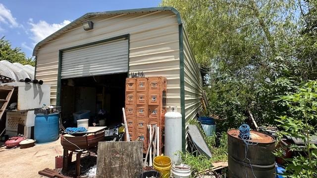 view of outbuilding with a garage