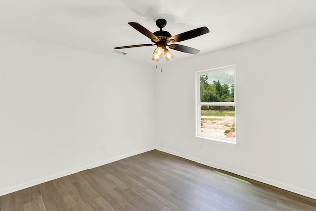 unfurnished room featuring ceiling fan and hardwood / wood-style flooring