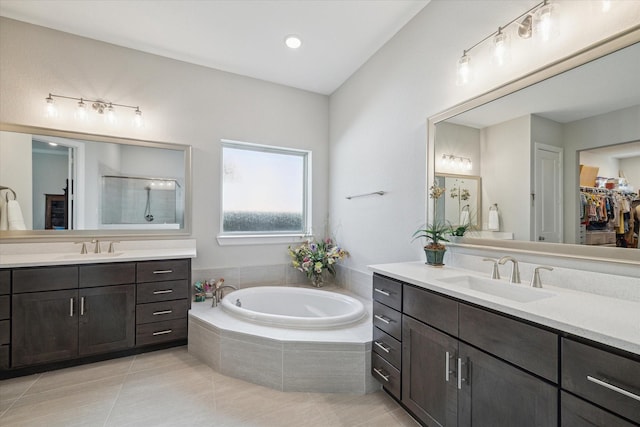 bathroom with vanity, separate shower and tub, and tile patterned flooring