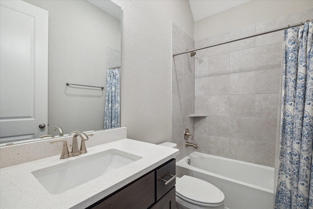 full bathroom with shower / bath combination with curtain, vanity, and toilet