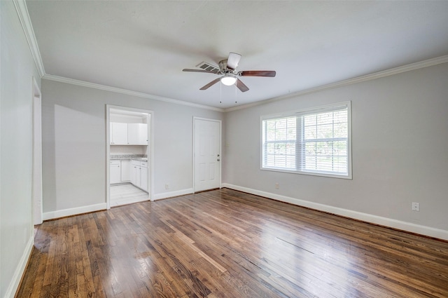 unfurnished bedroom with ceiling fan, hardwood / wood-style flooring, and crown molding