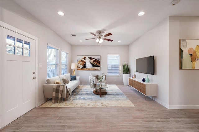 living room with ceiling fan