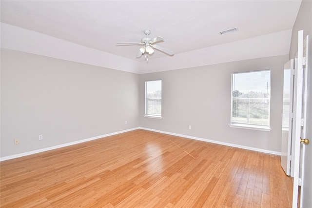 unfurnished room featuring ceiling fan and light wood-type flooring