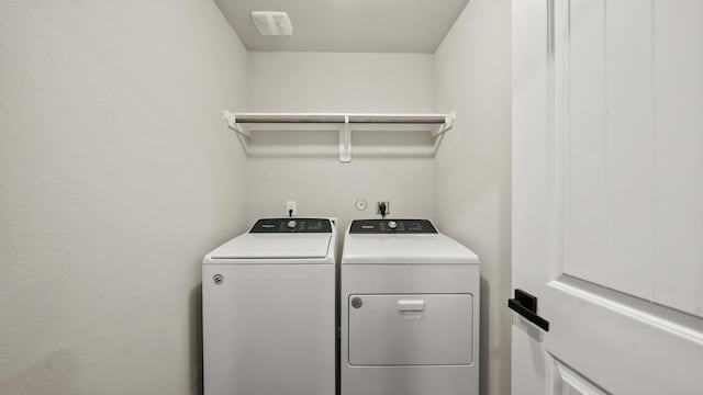 washroom with separate washer and dryer