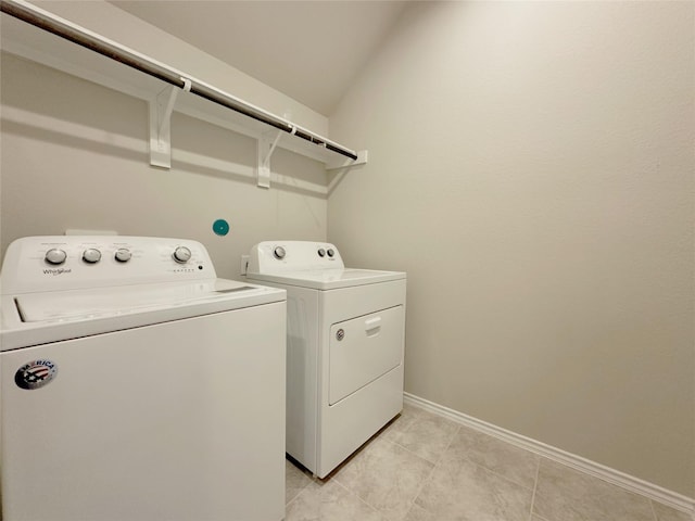 washroom with washer and dryer